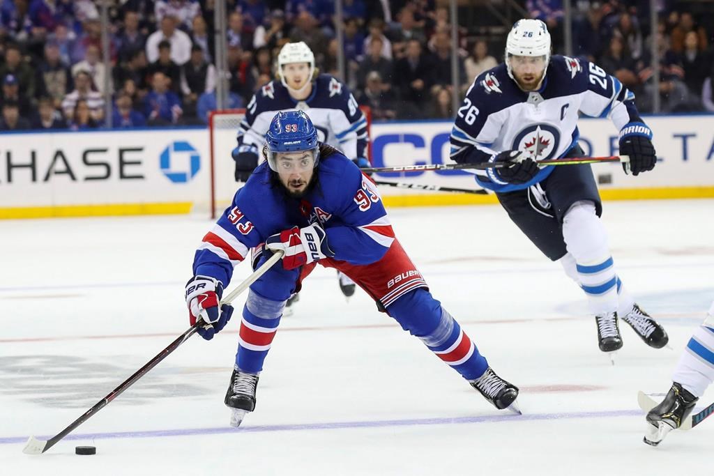 Howden scores late as Rangers beat Jets 6-4 in wild opener - Winnipeg ...