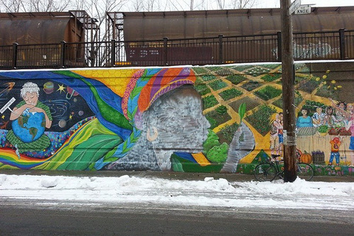 The face of a black woman depicted on the mural was defaced with white paint in 2013.