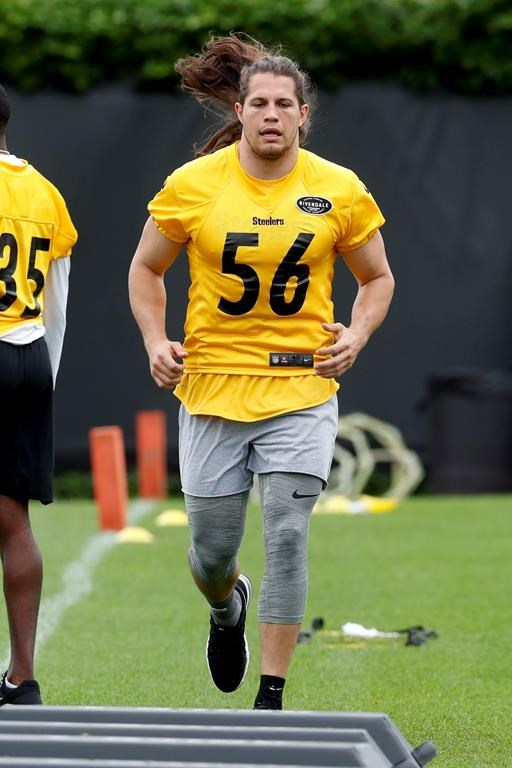 Pittsburgh Steelers’ linebacker Anthony Chickillo runs a drill during an NFL practice in late May. (AP Photo/Keith Srakocic, File)