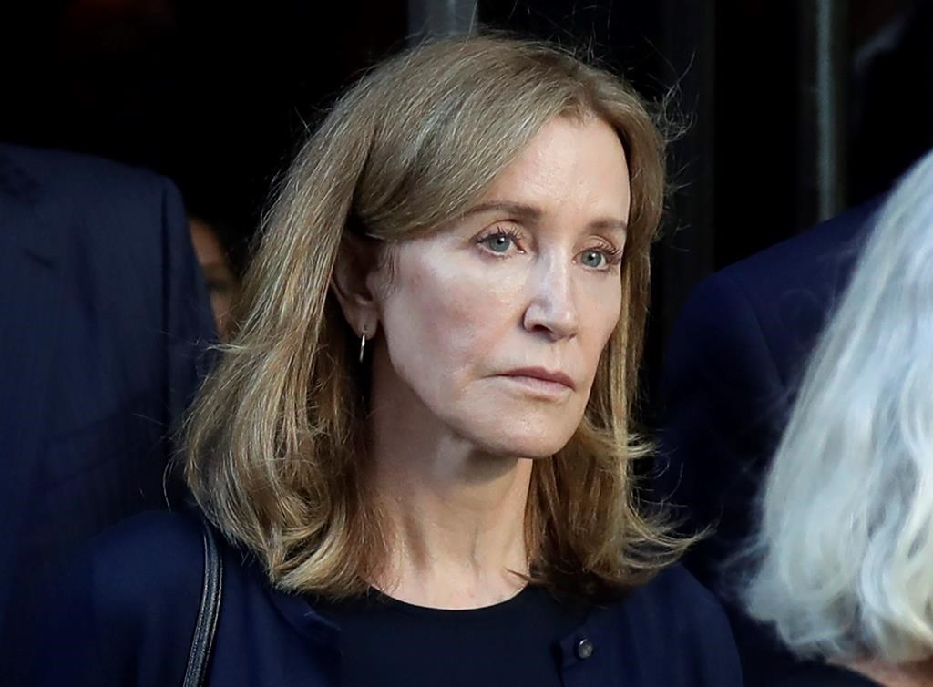 Actress Felicity Huffman leaving federal court after her sentencing in a nationwide college admissions bribery scandal in Boston.