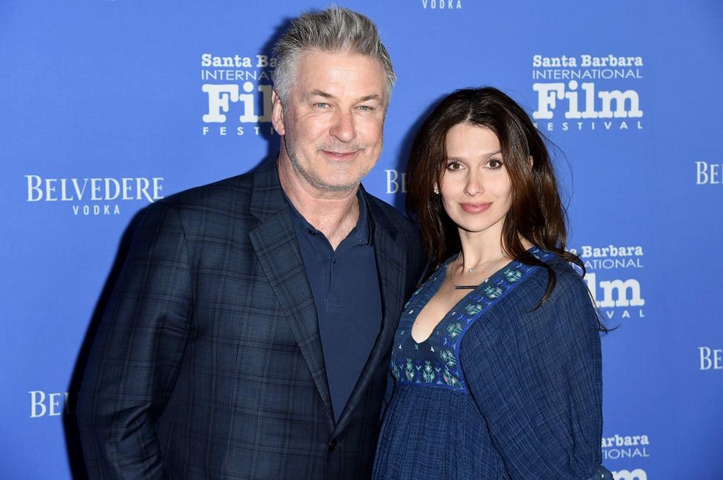 FILE - This Jan. 31, 2018 file photo shows Alec Baldwin, left, and Hilaria Baldwin at the Santa Barbara International Film Festival in Santa Barbara, Calif.
