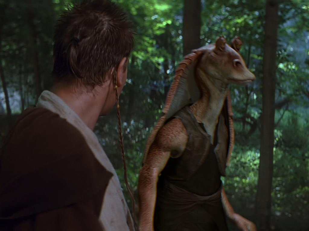 (L-R) Ewan McGregor as Obi Wan Kenobi and Ahmed Best as Jar Jar Binks in 1999’s ‘Star Wars: Episode I — The Phantom Menace.’