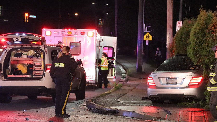 Police and paramedics on the scene of a serious crash in Surrey that sent two people to hospital on Oct. 4, 2019.