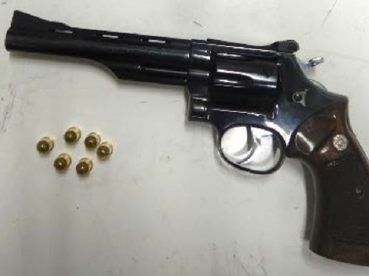 Police say this loaded gun was seized, along with cocaine and currency, following a drug bust earlier this month in Oliver, B.C.