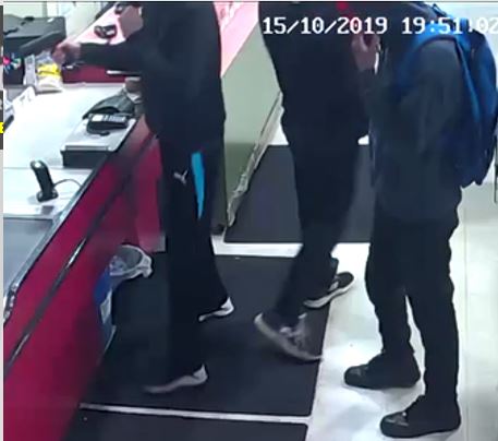 Edmonton police released surveillance video of three suspects alleged to have robbed a south Edmonton grocery store at gunpoint on Tuesday, Oct. 15, 2019.
