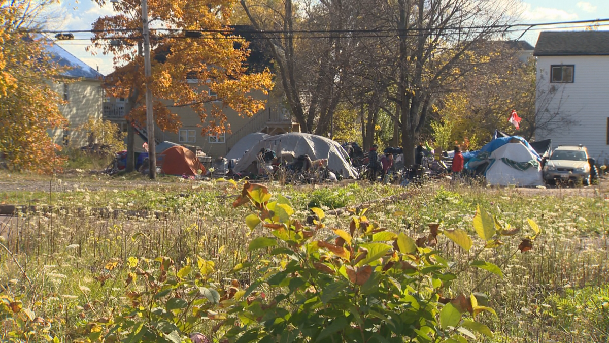 Several tents are set up at the corner of High and Park streets in Moncton.