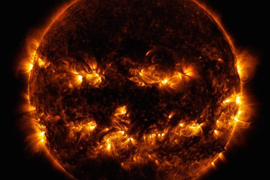 Active regions on the sun combined to look something like a jack-o-lantern’s face on Oct. 8, 2014.