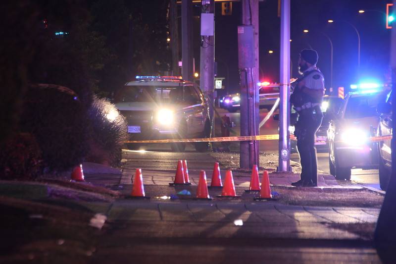 Police on the scene of Lakhwinder Singh Bal's murder in 2018. 