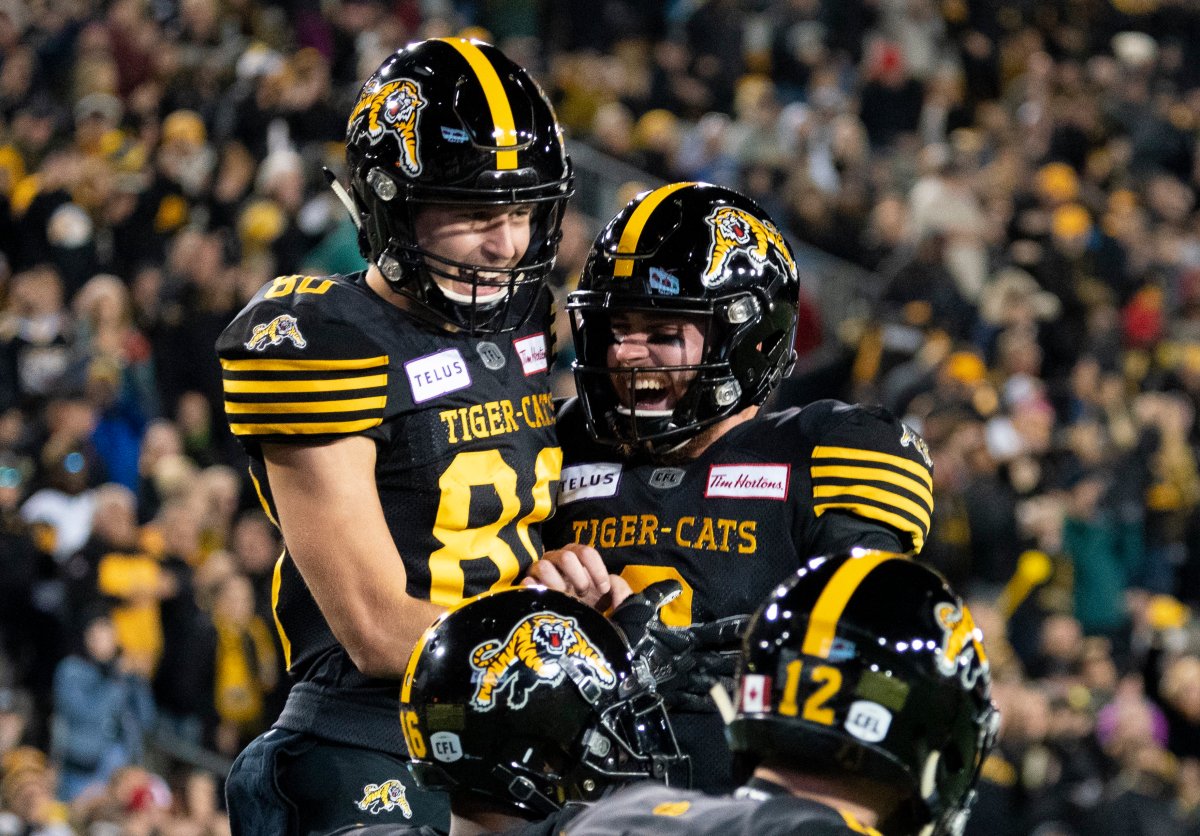 Hamilton Tiger Cats wide receiver Jaelon Acklin (80) celebrates his touchdown catch during first half CFL football game action against the Edmonton Eskimos, in Hamilton, Ont., Friday, Oct. 4, 2019.