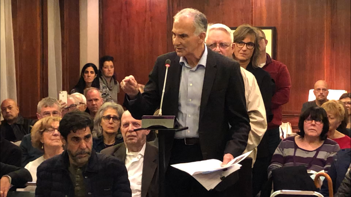 TMR resident Peter Malouf presents a petition at city council Tuesday October 22, 2019.