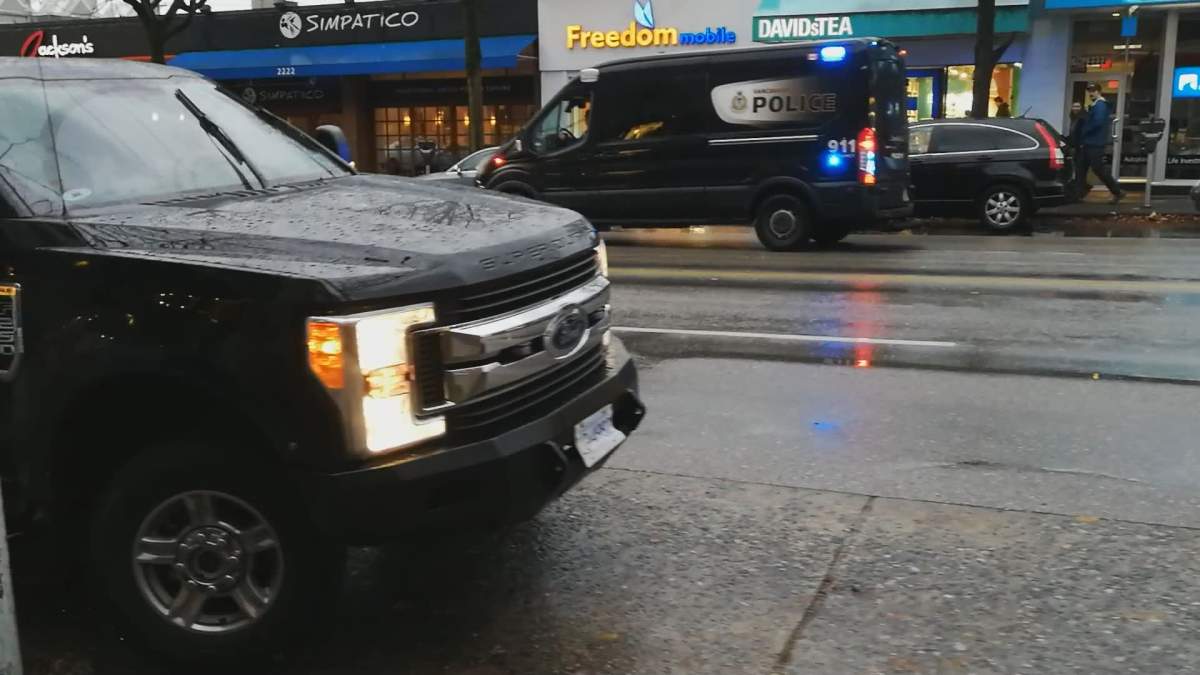 Vancouver police in Kitsilano where one of two men were arrested in connection to a homicide in Campbell River on Oct. 16, 2019.