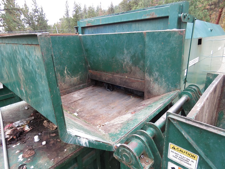 The garbage compactor.