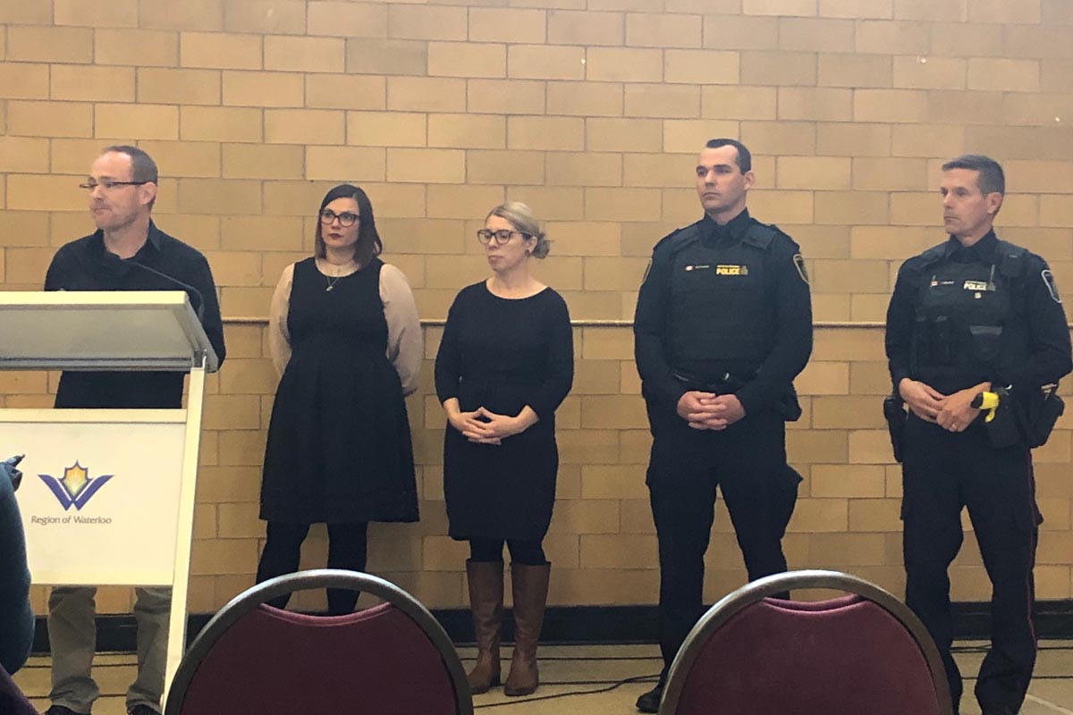 Dr. Chris Steingart takes a question from the media as Waterloo Public Health’s Julie KalfBleish and Grace Bermingham, along with Waterloo Regional Police Insp. Mark Crowell and Const. James Mitchell, look on.