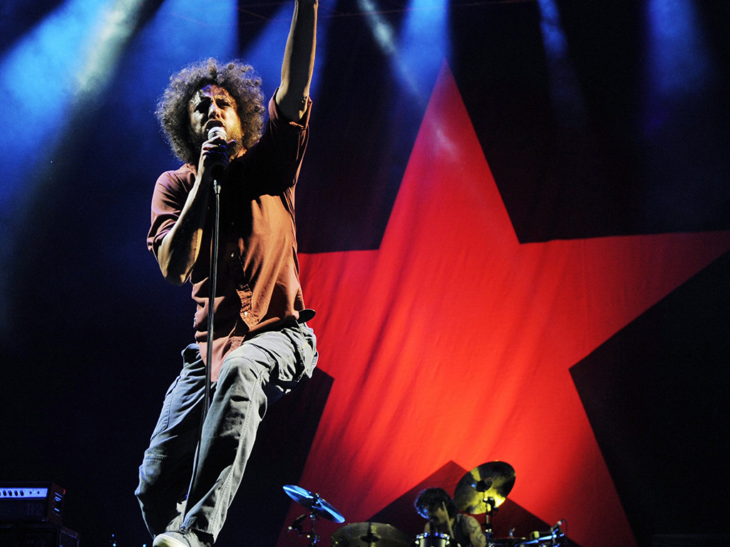 Zack de la Rocha of Rage Against the Machine performs during the band's headlining set at the 'L.A. Rising' concert at the Los Angeles Coliseum, Saturday, July 30, 2011, in Los Angeles, Calif.