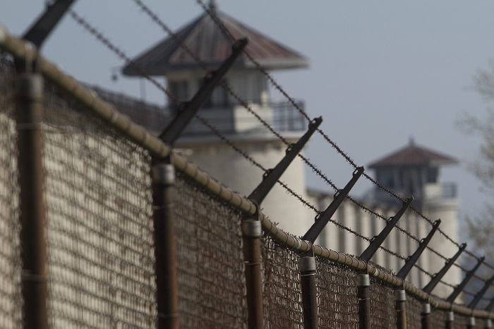 The fence outside the Kingston Penitentiary in Kingston, Ont., on Thursday April 19, 2012. 