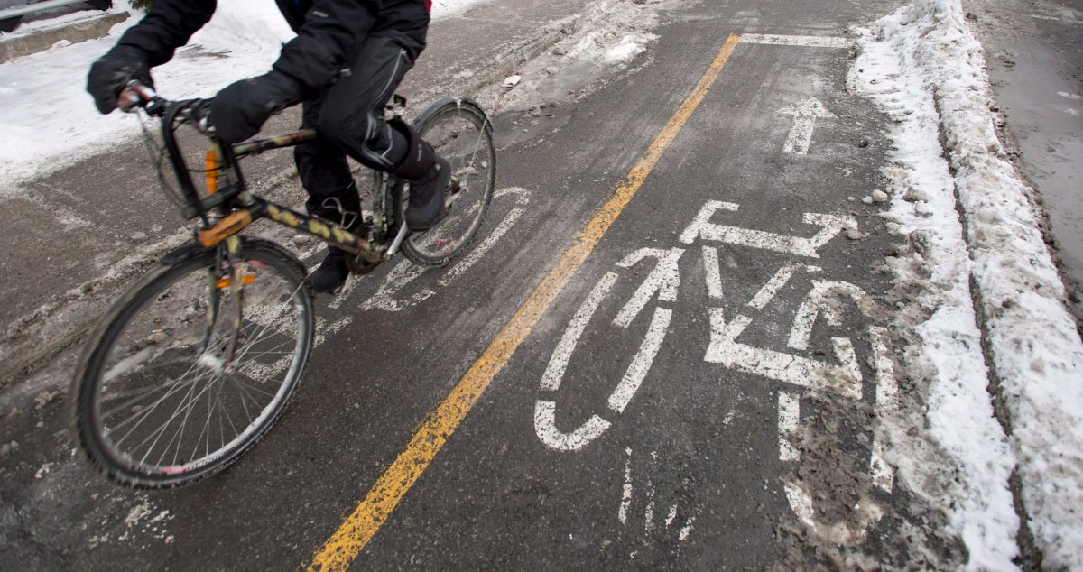 A cyclist makes his way down a bike path in Montreal on Tuesday, Feb. 17, 2015.