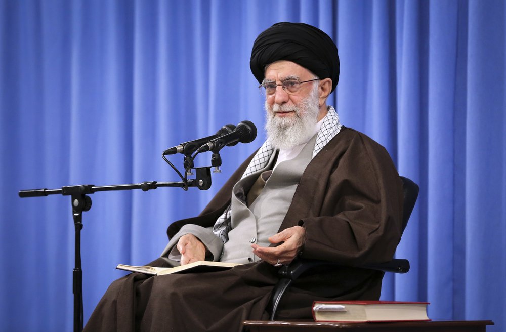 In this picture released by an official website of the office of the Iranian supreme leader, Supreme Leader Ayatollah Ali Khamenei talks to clerics in his Islamic thoughts class in Tehran, Iran, Sunday, Nov. 17, 2019. Iran's supreme leader on Sunday backed the government's decision to raise gasoline prices and called angry protesters who have been setting fire to public property over the hike "thugs," signaling a potential crackdown on the demonstrations. 