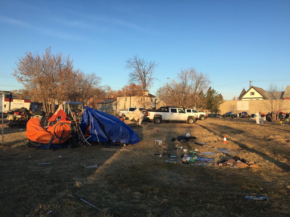 A homeless encampment in central Edmonton being taken down on Friday, Nov. 1, 2019.