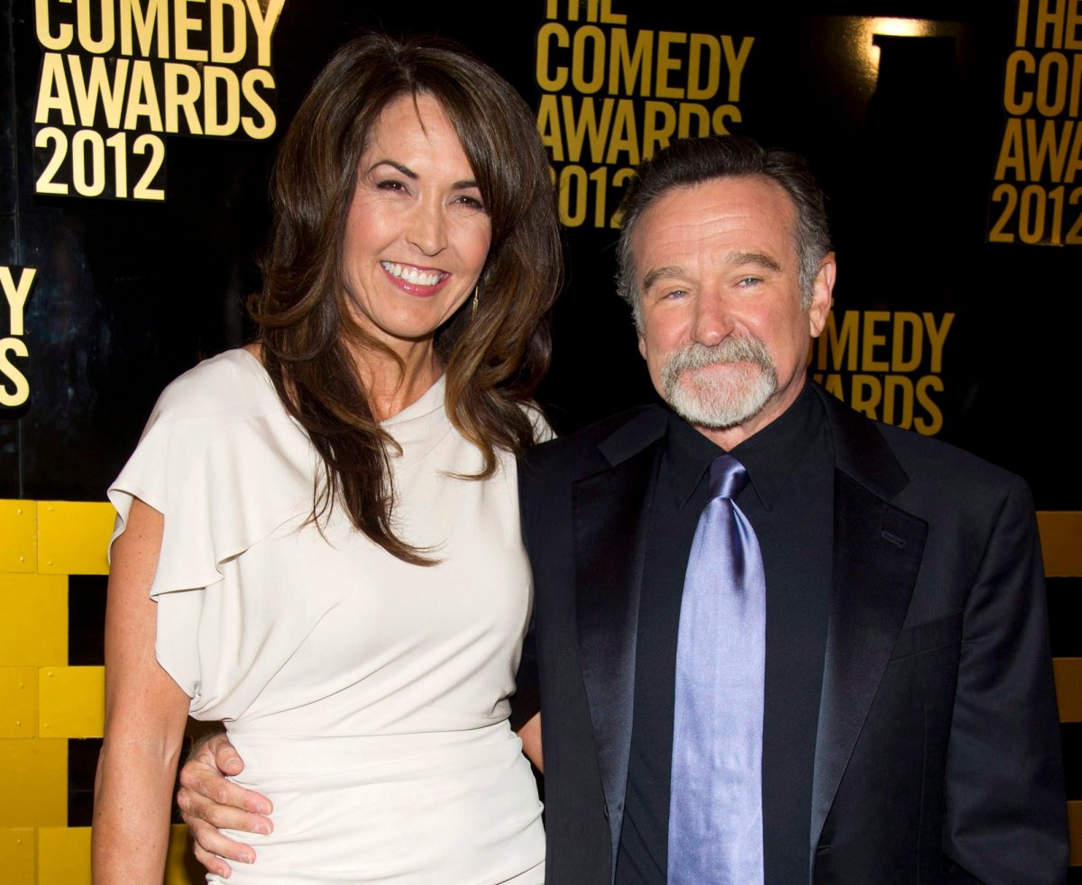 Robin Williams, right, and his wife Susan Schneider Williams arrive at The 2012 Comedy Awards in New York. Schneider wrote an essay published in the medical journal, "Neurology," on Sept. 27, 2016, that Williams had "chemical warfare in his brain" before his death.