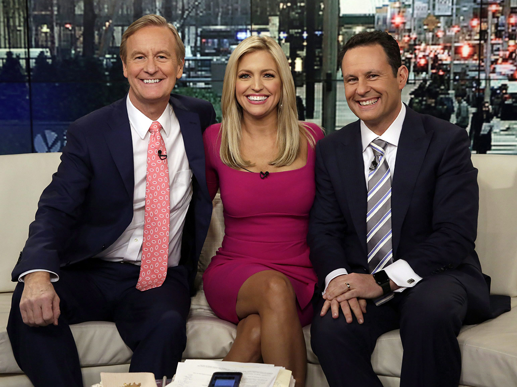 In this Feb. 29, 2016 file photo, co-hosts Steve Doocy, from left, Ainsley Earhardt and Brian Kilmeade appear on the morning show ‘Fox & Friends’ in New York City.