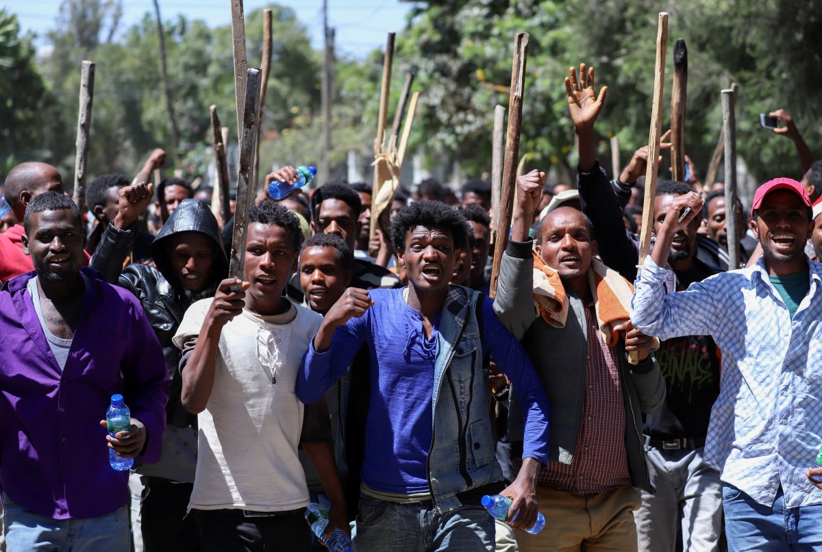 Oromo youth chant slogans during a protest in-front of Jawar Mohammed's house, an Oromo activist and leader of the Oromo protest in Addis Ababa, Ethiopia, October 24, 2019. 