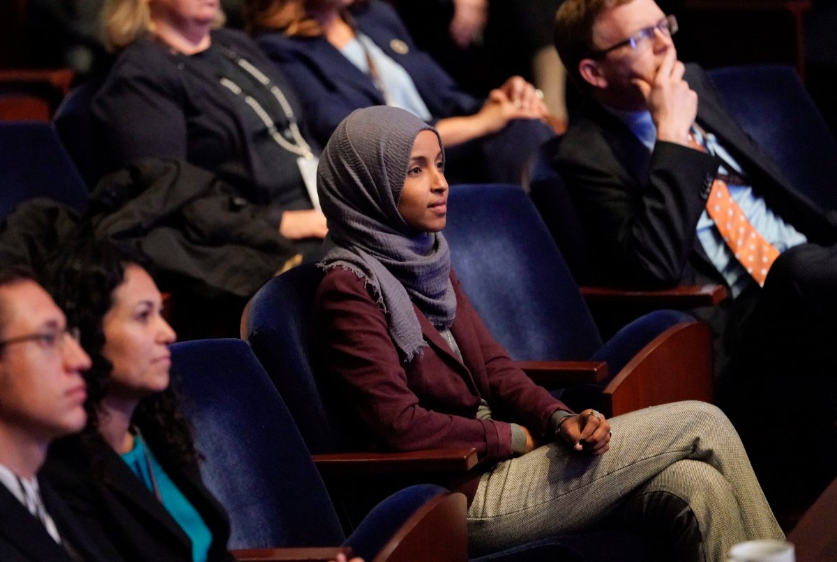 In this Nov. 15, 2018 file photo, Rep.-elect IIhan Omar, D-Minn., center, listens during member-elect orientations on Capitol Hill in Washington. 