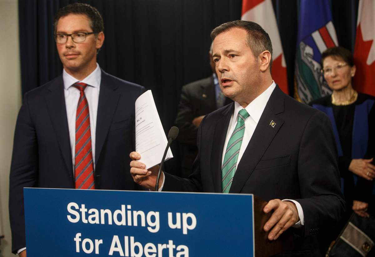 Alberta premier Jason Kenney, right and Doug Schweitzer, Minister of Justice and Solicitor General, in Edmonton Alta, on Wednesday June 26, 2019. 
