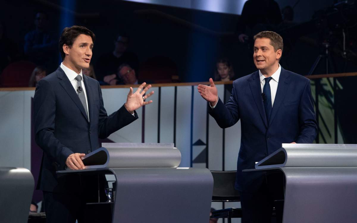 Liberal leader Justin Trudeau and Conservative leader Andrew Scheer take part in the the Federal leaders French language debate in Gatineau, Que. on Thursday, October 10, 2019. 