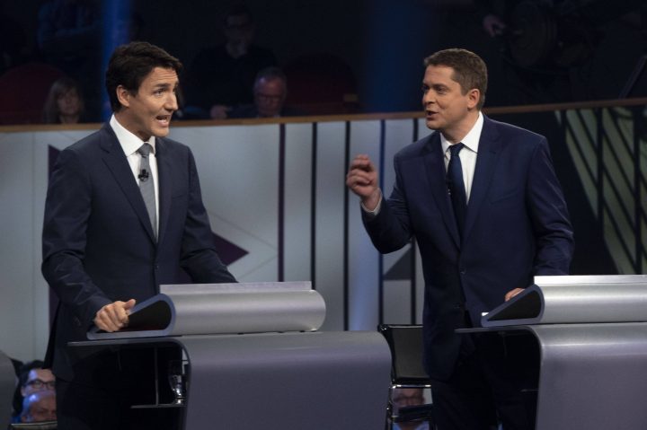 Liberal leader Justin Trudeau and Conservative leader Andrew Scheer take part in the the Federal leaders French language debate in Gatineau, Que. on Thursday, October 10, 2019. 