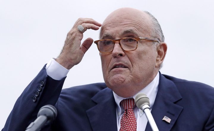 In this Aug. 1, 2018 file photo, Rudy Giuliani, attorney for President Donald Trump, addresses a gathering during a campaign event in Portsmouth, N.H.