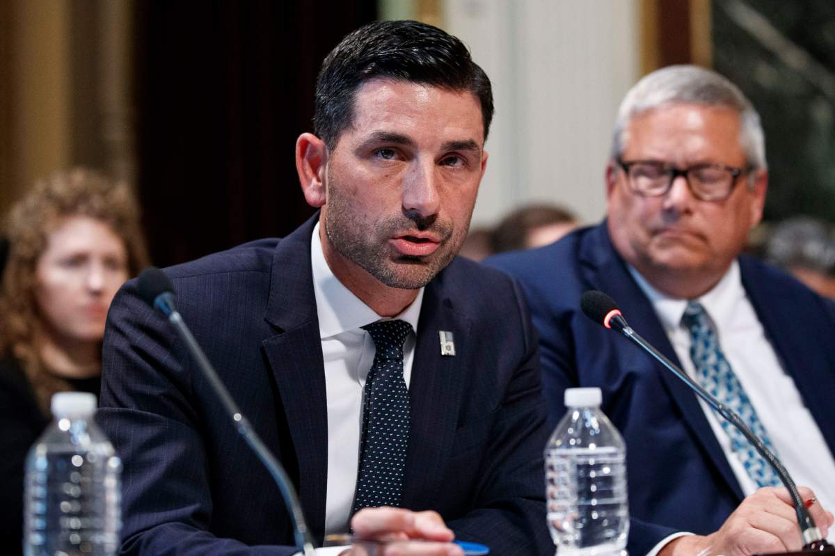 In this Oct. 29, 2019 photo, new acting Homeland Security secretary Chad Wolf speaks during a meeting inside the White House complex in Washington. 