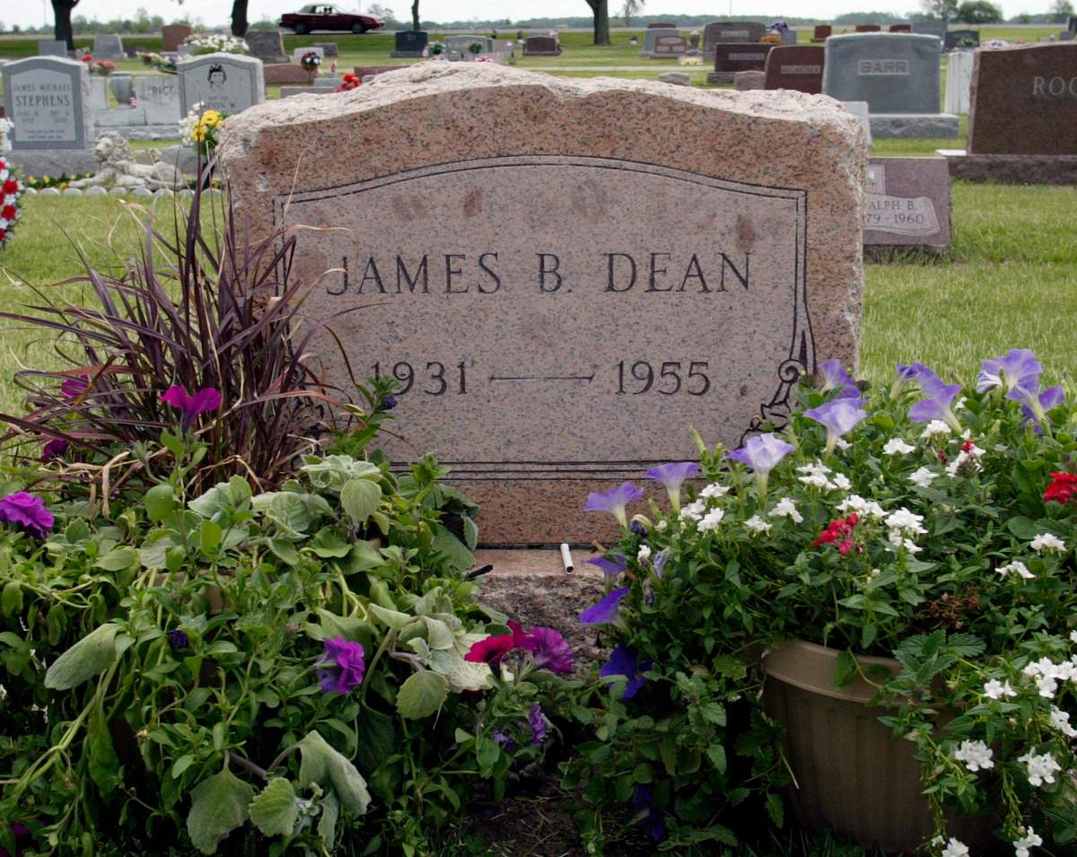 This May 27, 2005 file photo shows plants and flowers at the grave of actor James Dean in Fairmount, Ind.