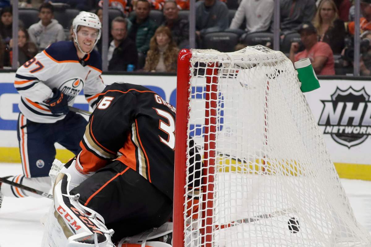 Edmonton Oilers center Connor McDavid scores past Anaheim Ducks goaltender John Gibson during the first period of an NHL hockey game in Anaheim, Calif., Sunday, Nov. 10, 2019. (AP Photo/Chris Carlson).
