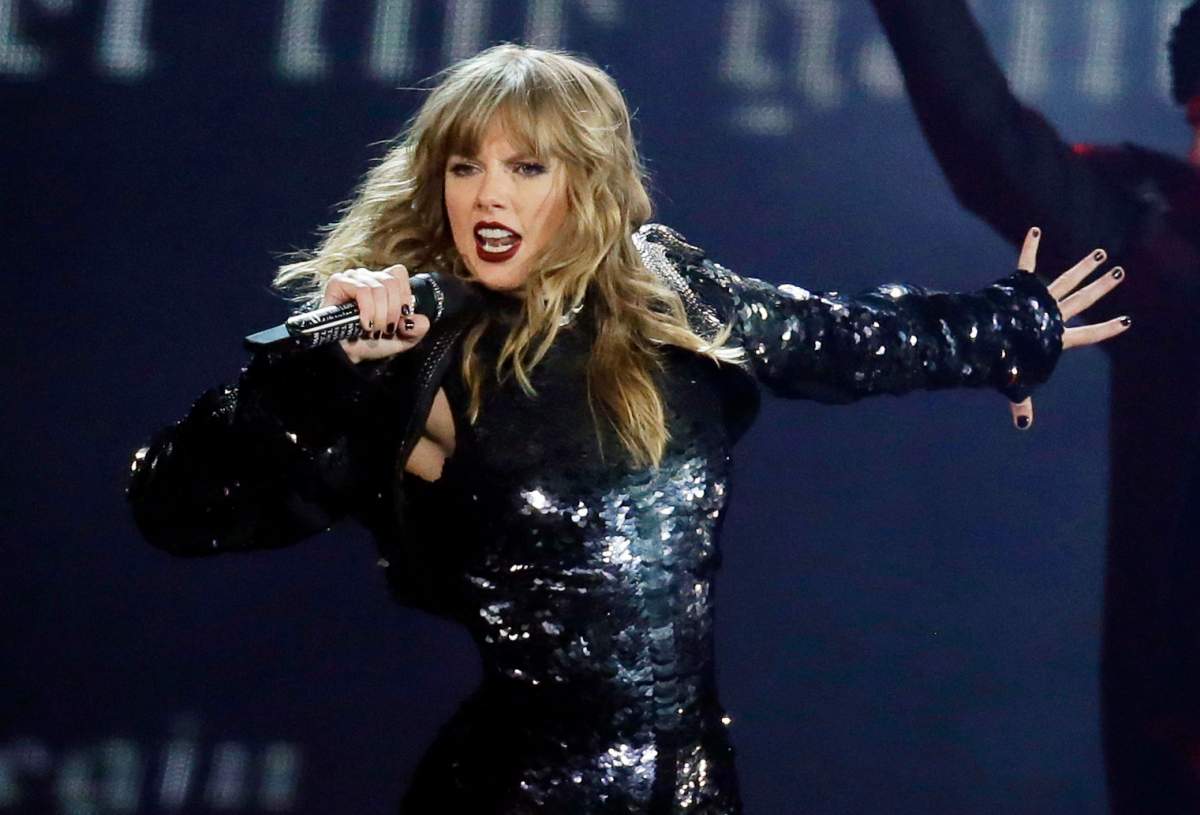 FILE - This May 8, 2018 file photo shows Taylor Swift performing during her "Reputation Stadium Tour" opener in Glendale, Ariz.