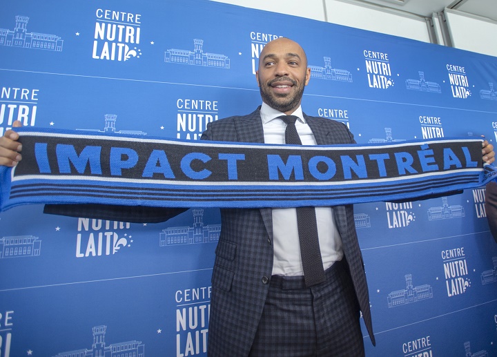 Montreal Impact new head coach Thierry Henry poses for photos after a news conference Monday, November 18, 2019 in Montreal. 