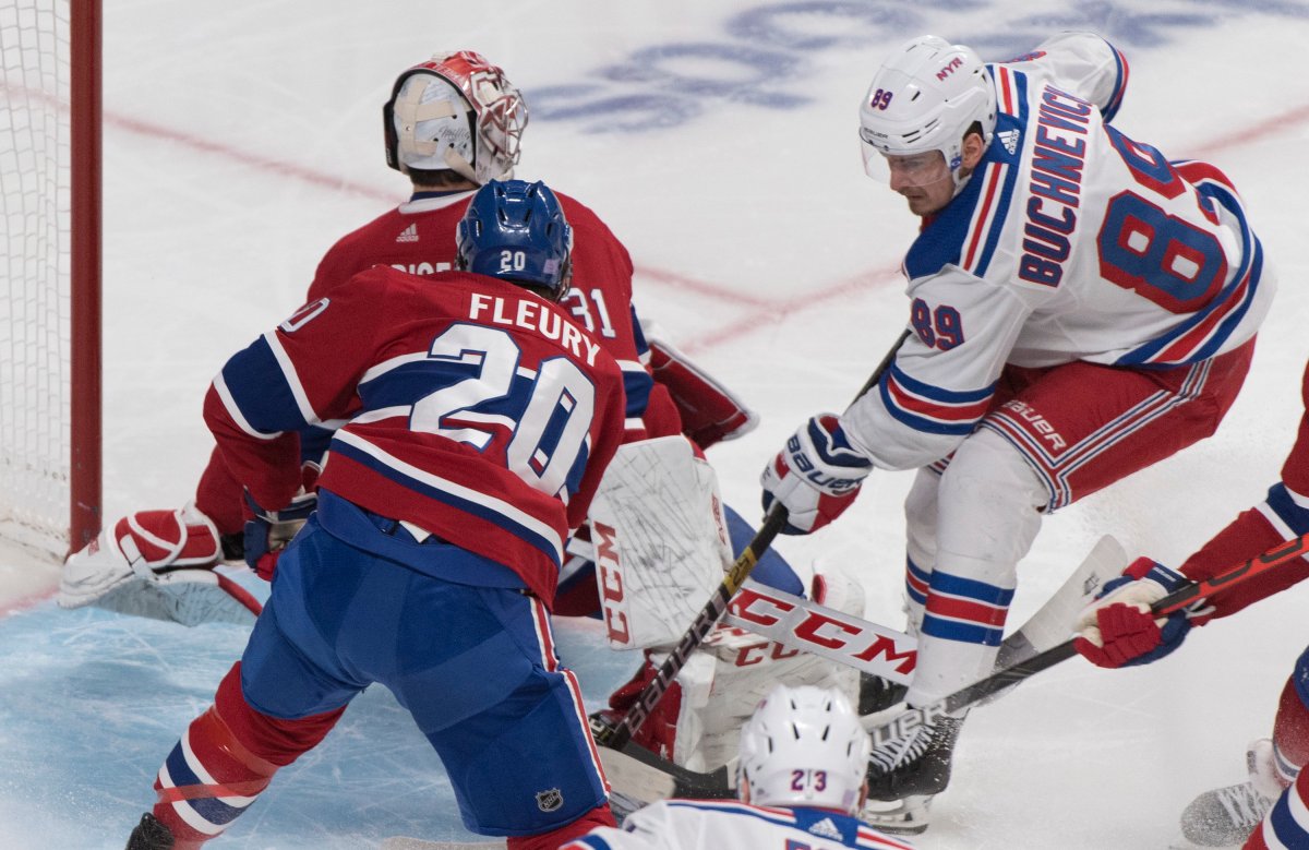 New York Rangers' Pavel Buchnevich (89) scores against Montreal Canadiens goaltender Carey Price as Canadiens' Cale Fleury defends during second period NHL hockey action in Montreal, Saturday, November 23, 2019. 