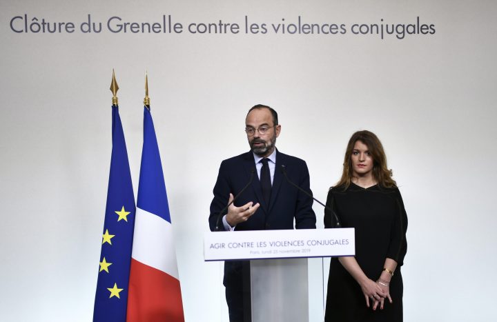 French Prime Minister Edouard Philippe (L) delivers a speech on domestic violence, next to French Junior Minister for Gender Equality Marlene Schiappa (R) during the International Day for the Elimination of Violence against Women in Paris, Nov. 25.