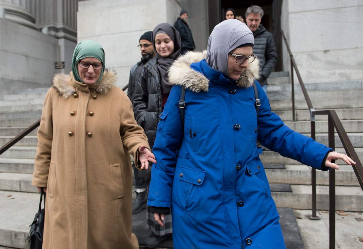 Women wearing hijabs leave the Quebec Court of Appeal in Montreal, Tuesday, Nov. 26, 2019, where members of the National Council of Muslims and the Canadian Civil Liberties Association (CCLA) challenged Quebec's Bill 21. 