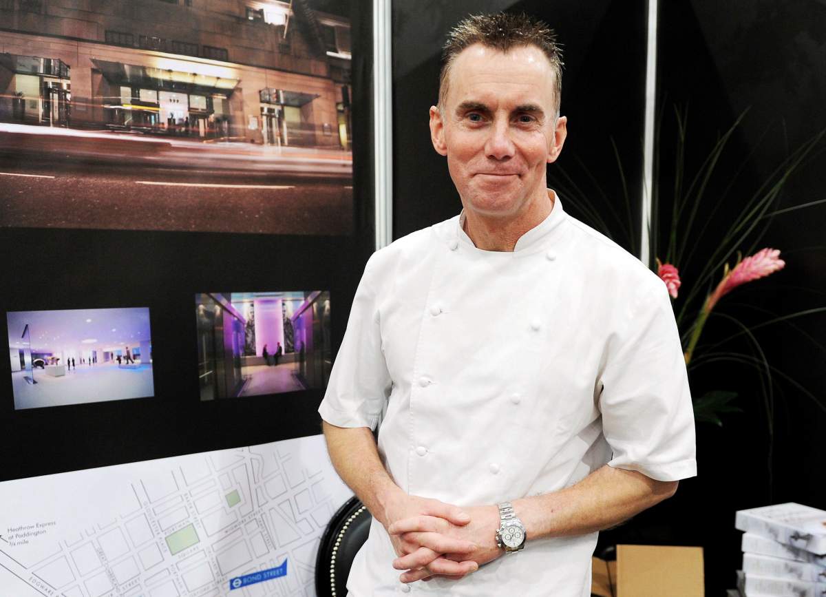 This Dec. 2, 2011 file photo shows Gary Rhodes in his pop-up restaurant at the Taste of Christmas food and drink festival at ExCeL Centre, London, England.