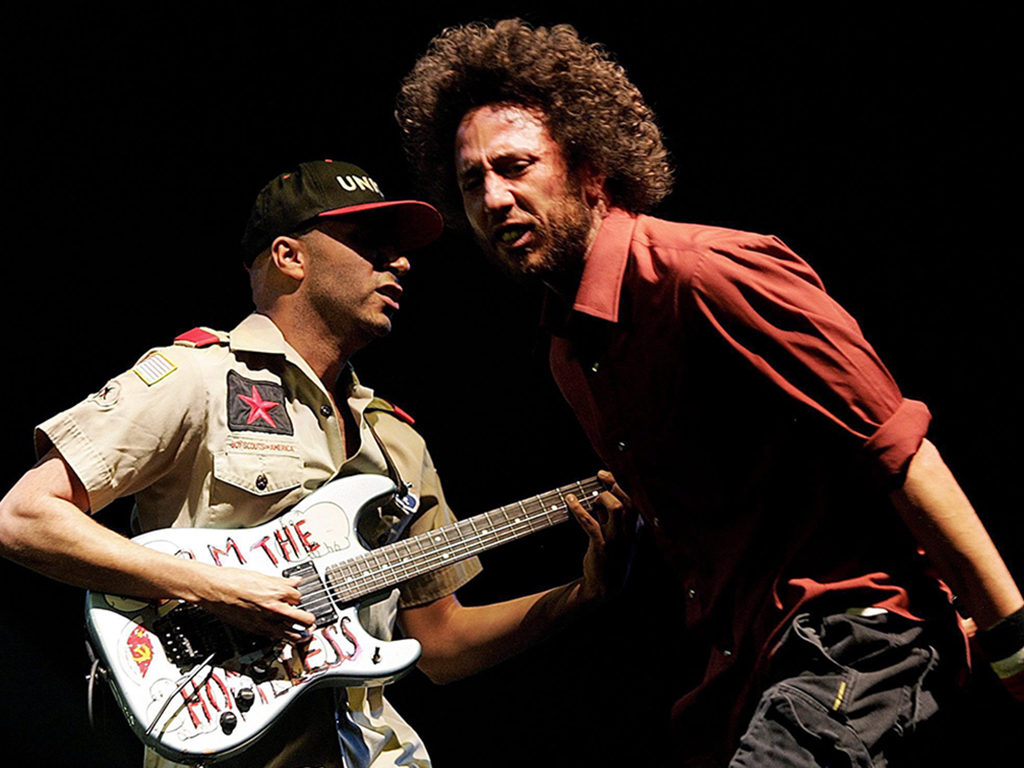 Tom Morello, left, and Zack de la Rocha of Rage Against the Machine perform at the Coachella Valley Music and Arts Festival in Indio, Calif., on Sunday, April 29, 2007.