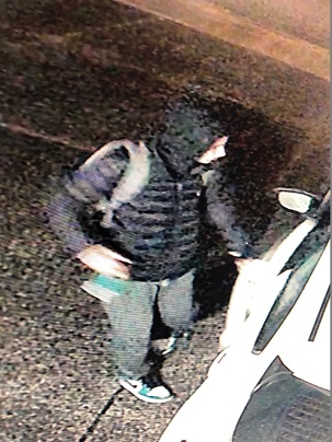 A man caught on surveillance video breaking into a vehicle in South Surrey on Oct. 5, 2019.