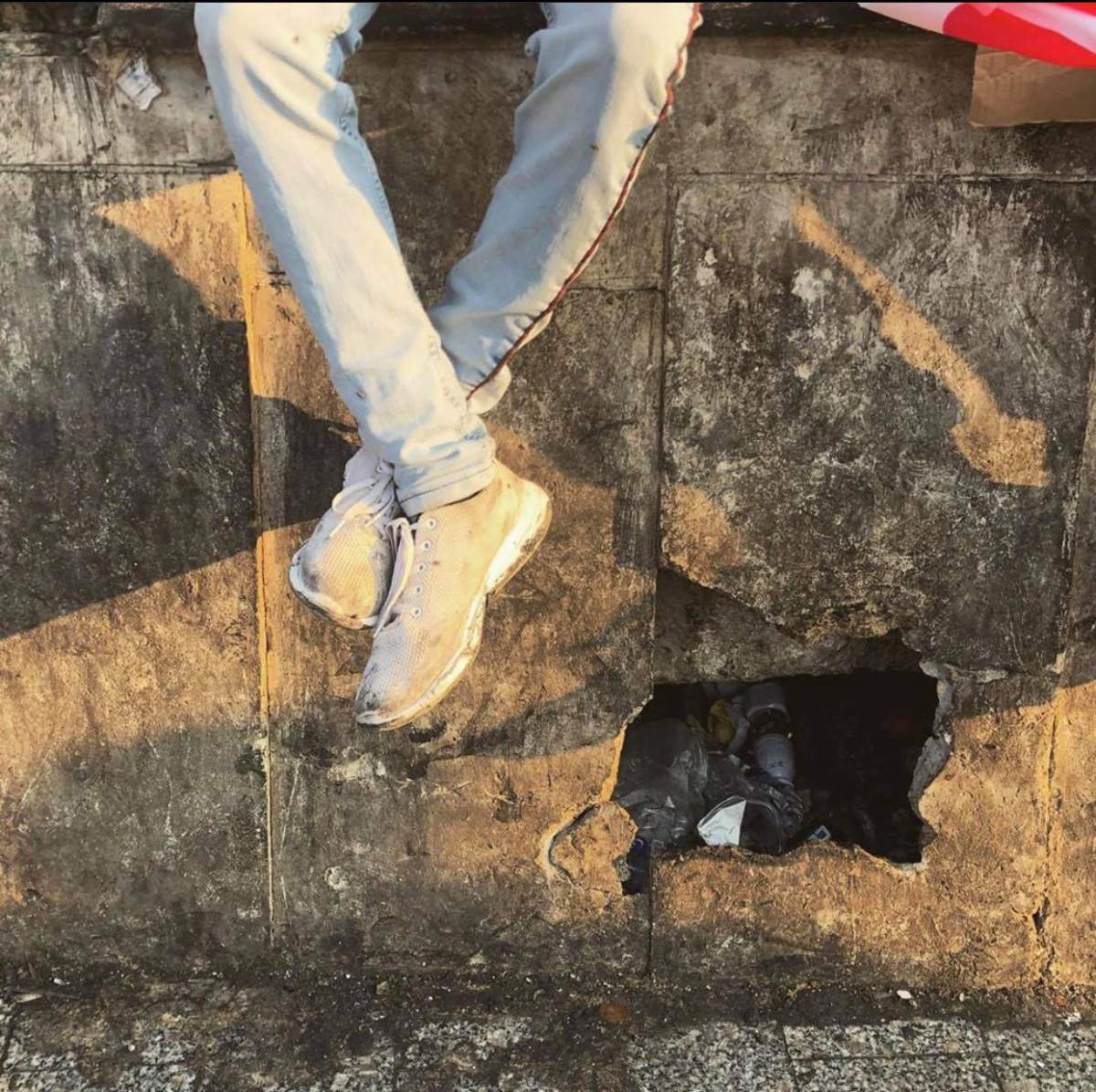 A hole that was made after Nader says a tear gas bomb went through the wall.