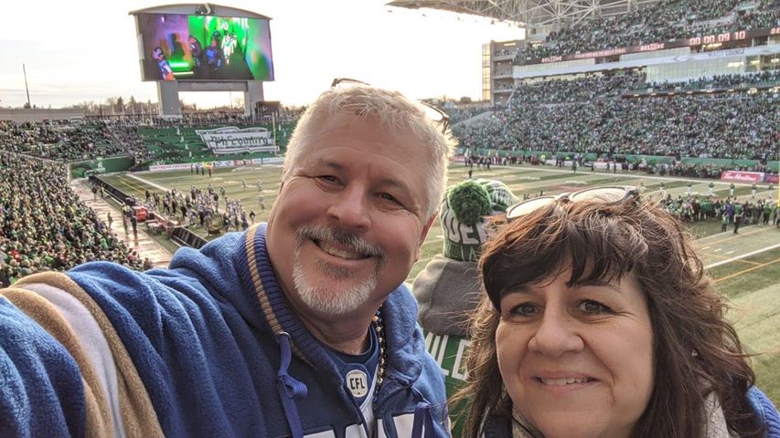 Nicki and John Clearwater cheering on the Blue and Gold on Sunday in Regina.