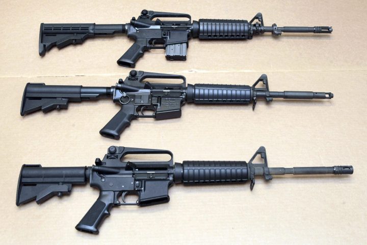 In this Aug. 15, 2012, file photo, three variations of the AR-15 rifle are displayed at the California Department of Justice in Sacramento, Calif.