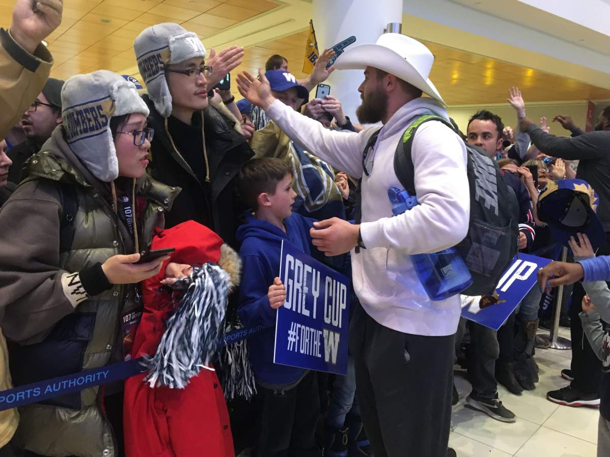 The Bombers took time to meet fans after their arrival.