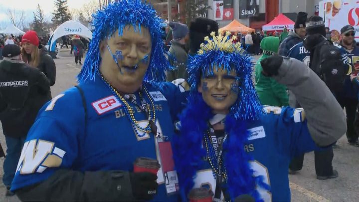 Will and Janet Tewnion were decked out in Winnipeg Blue Bombers colours in Calgary on Sunday, Nov. 24, 2019.