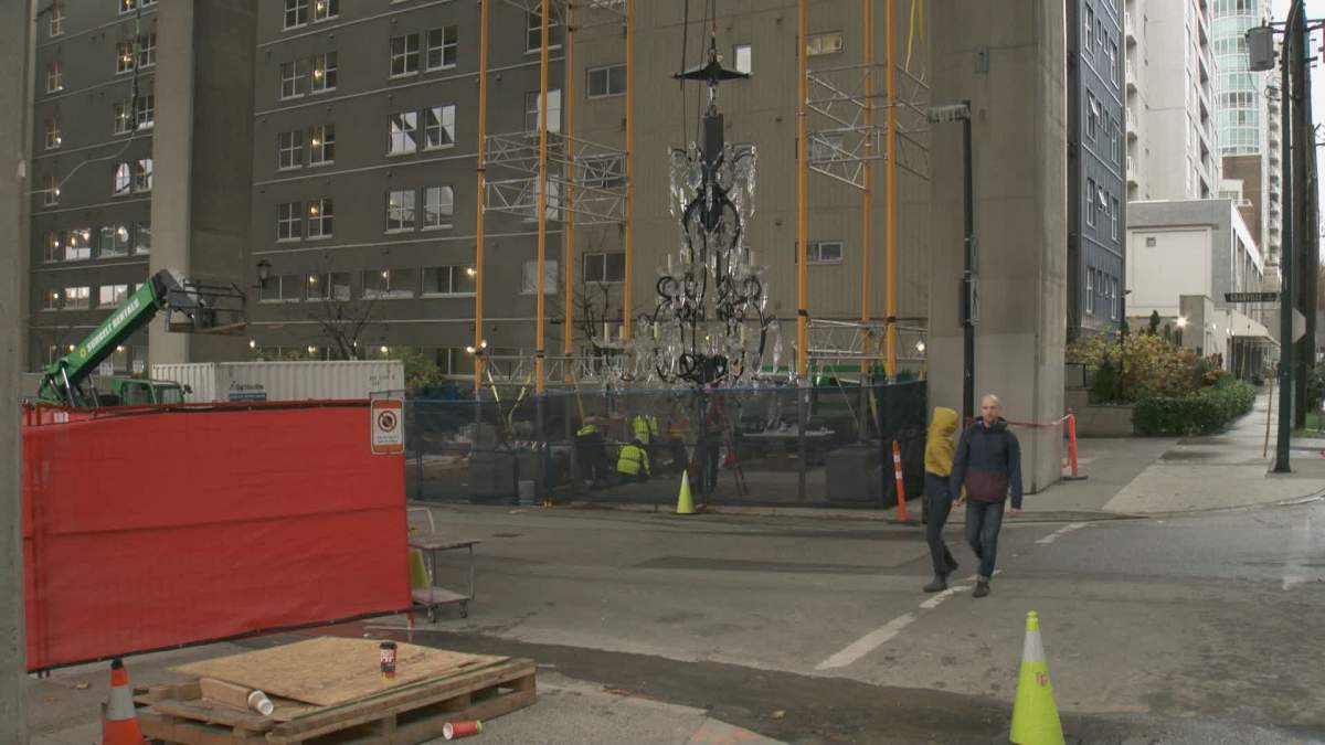 Crews work to install Rodney Graham’s $4.88 million Spinning Chandelier.