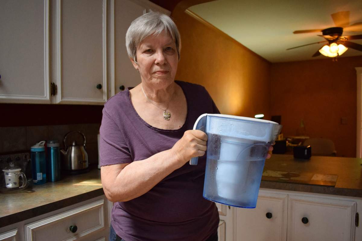 Monica Baehr uses a Zero Water filter for drinking water at her home in Calgary, Alta. (Mackenzie Lad/IIJ)