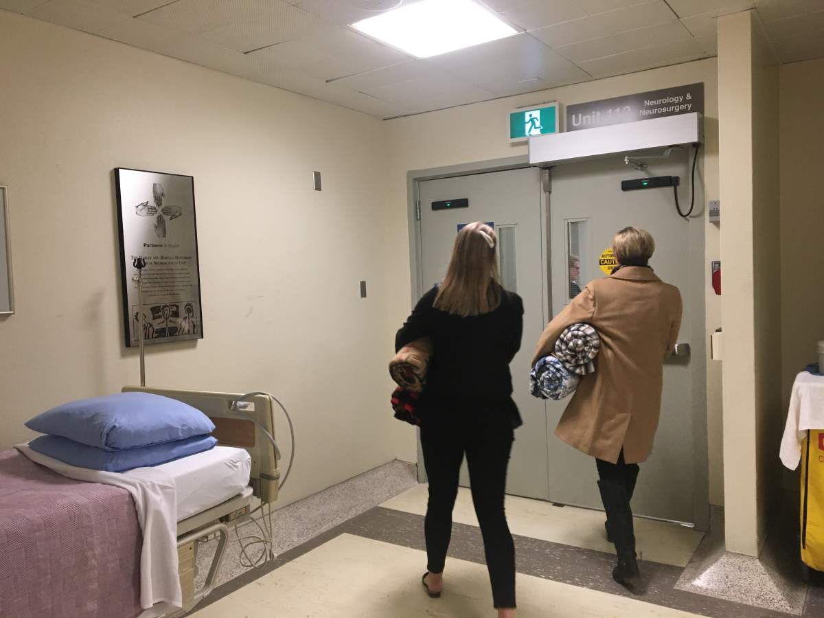 Caroline and Amanda Stephenson walking onto Unit 112 at Foothills Hospital.