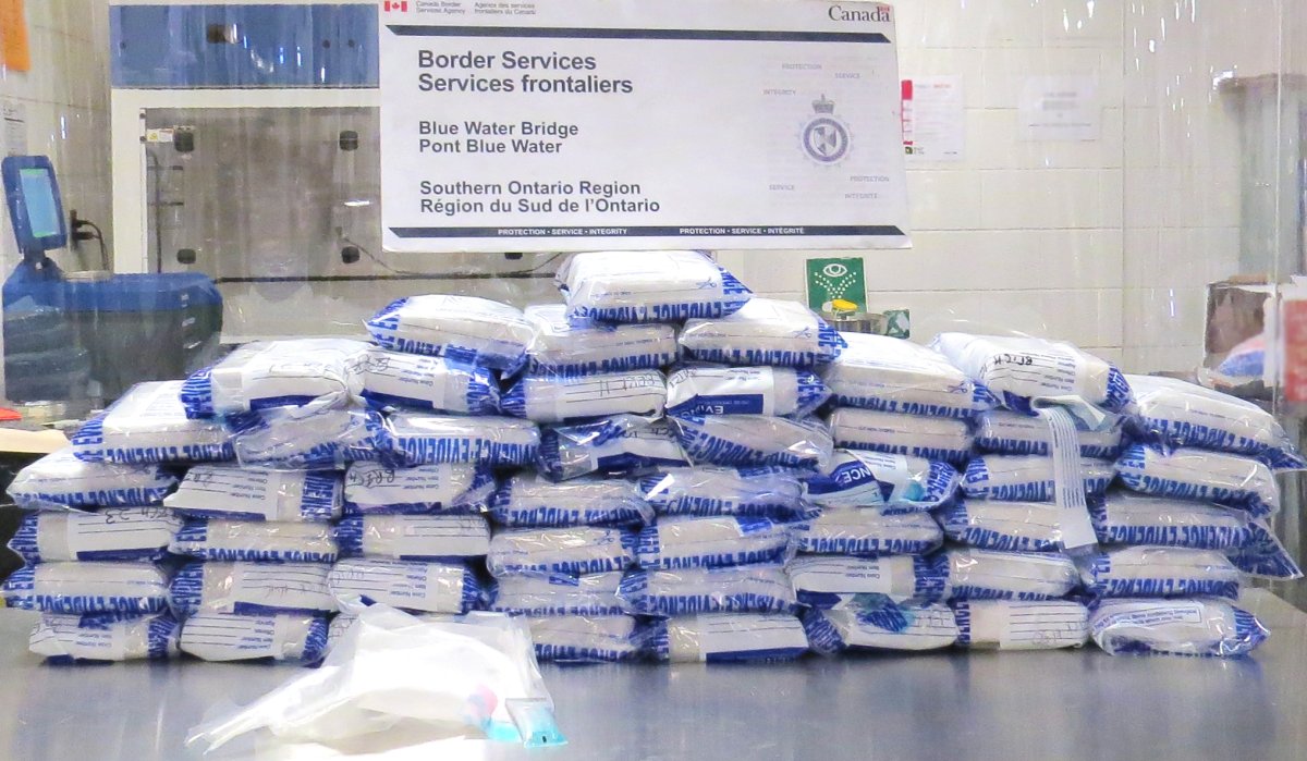 Canada Border Services Agency says 50 packages of suspected cocaine were found inside boxes in a tractor trailer at the Blue Water Bridge near Sarnia, Ont.